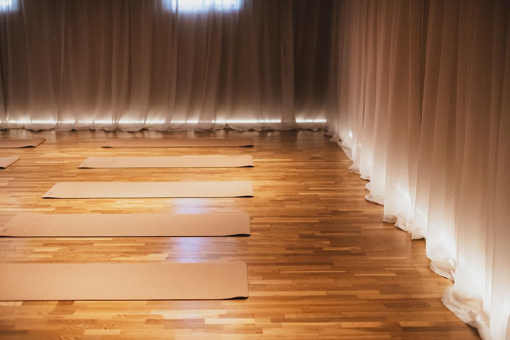 The Studio — yoga mats at floor level