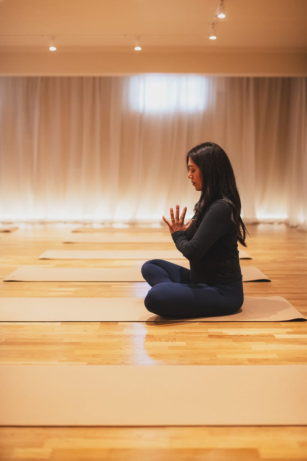 The Studio — practitioner meditating