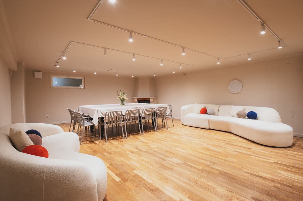 The Workshop — dining table and sofas